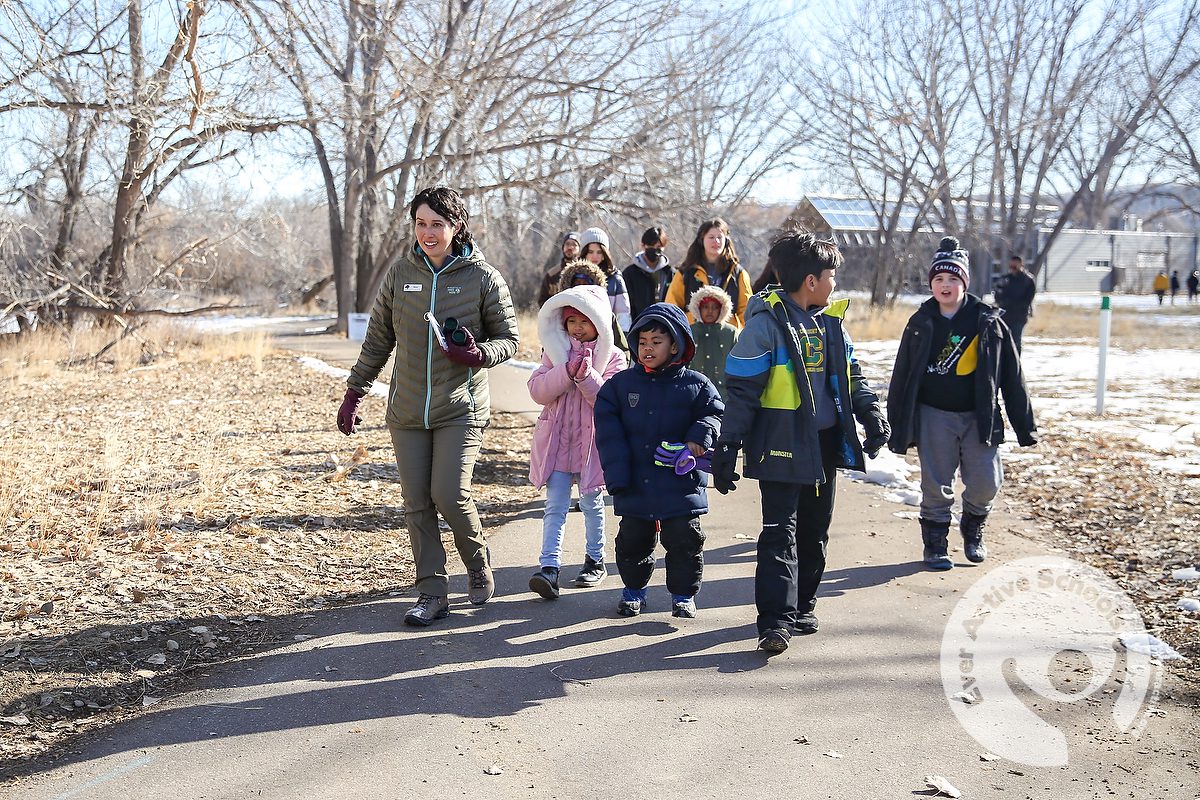 A group of new Canadian children and youth embark on a guided nature walk at Police Point Park in Medicine Hat, Alta as part of a Resettlement Through Recreation celebration day with Ever Active Schools.