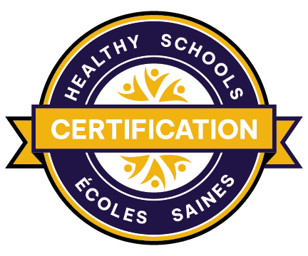 Healthy Schools Certification badge. Navy badge with gold accents and white text.